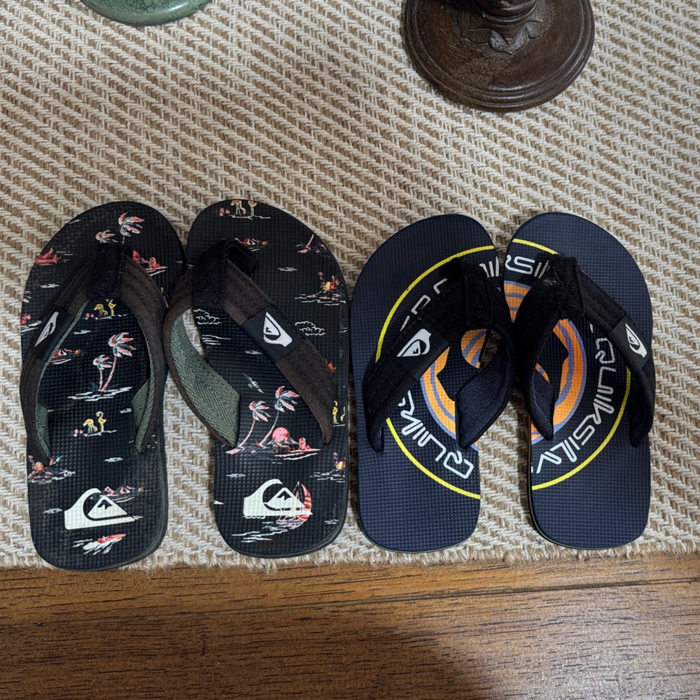 2 Quicksilver Flip Flops - Black and Blue